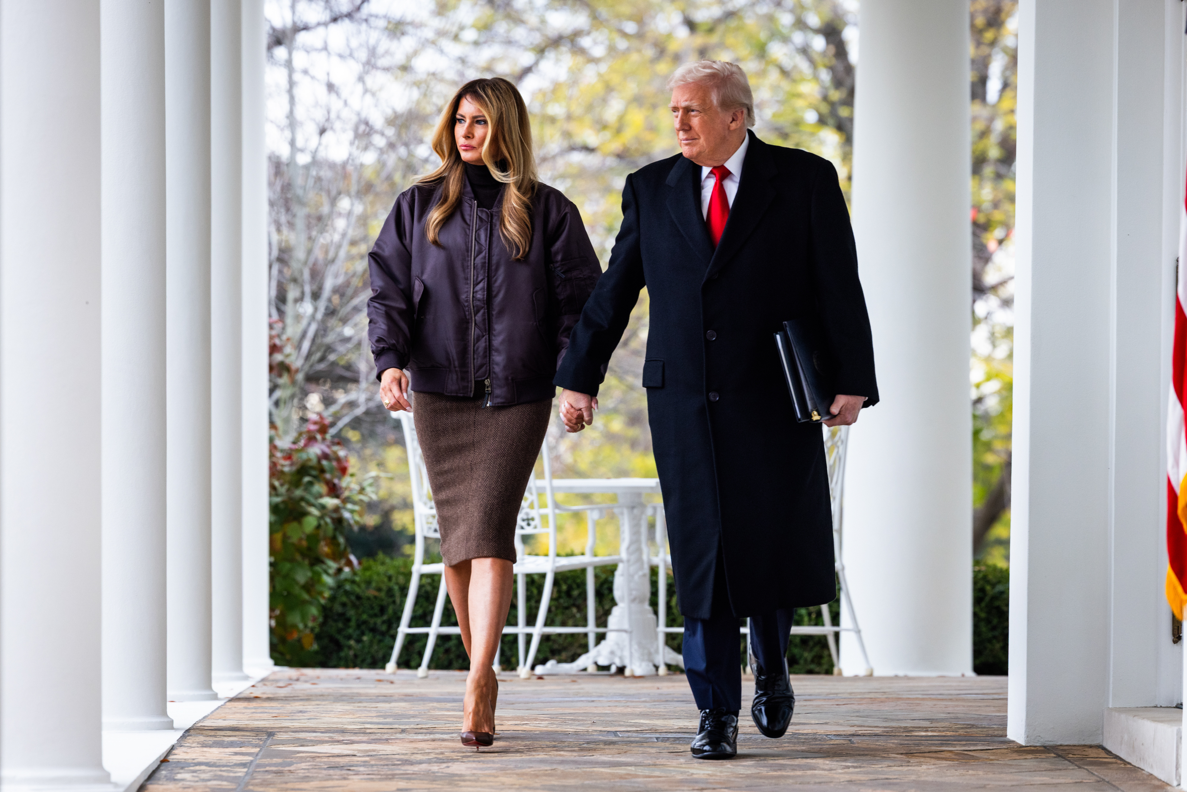 Melania Trump suits up in trendy bomber jacket for annual White House ...