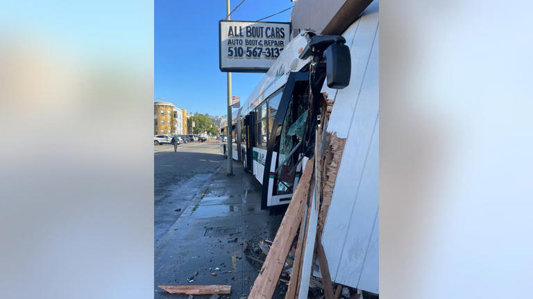 AC Transit bus crashes into Oakland building, sends 11 to hospital