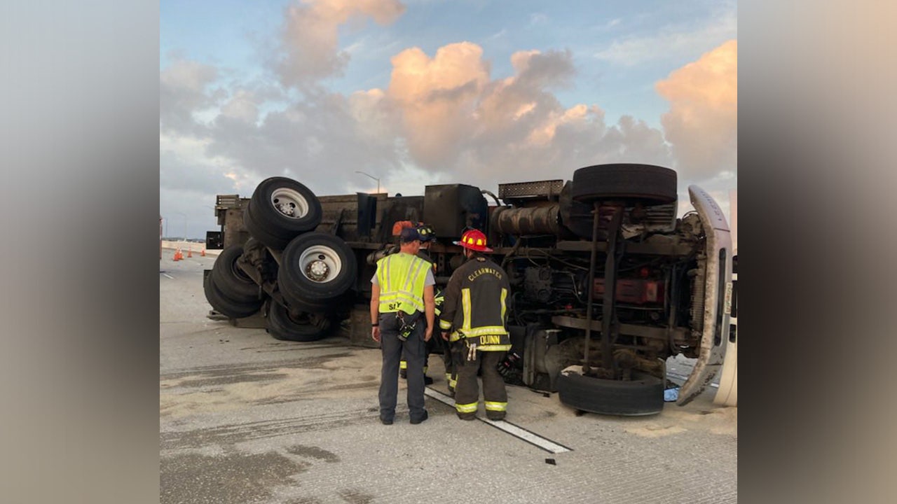 Garbage truck flips on side on Bayside Bridge in Clearwater, southbound ...
