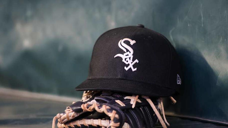 Jul 14, 2023; Atlanta, Georgia, USA; A detailed view of a Chicago White Sox hat and glove in the dugout against the Atlanta Braves in the fourth inning at Truist Park. Mandatory Credit: Brett Davis-Imagn Images | Brett Davis-Imagn Images