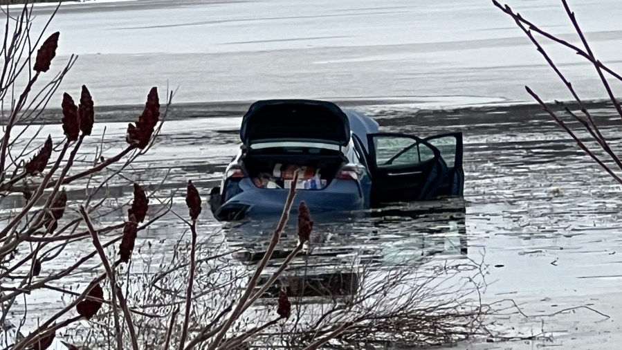 Driver rescued after car crashes through ice into Long Pond