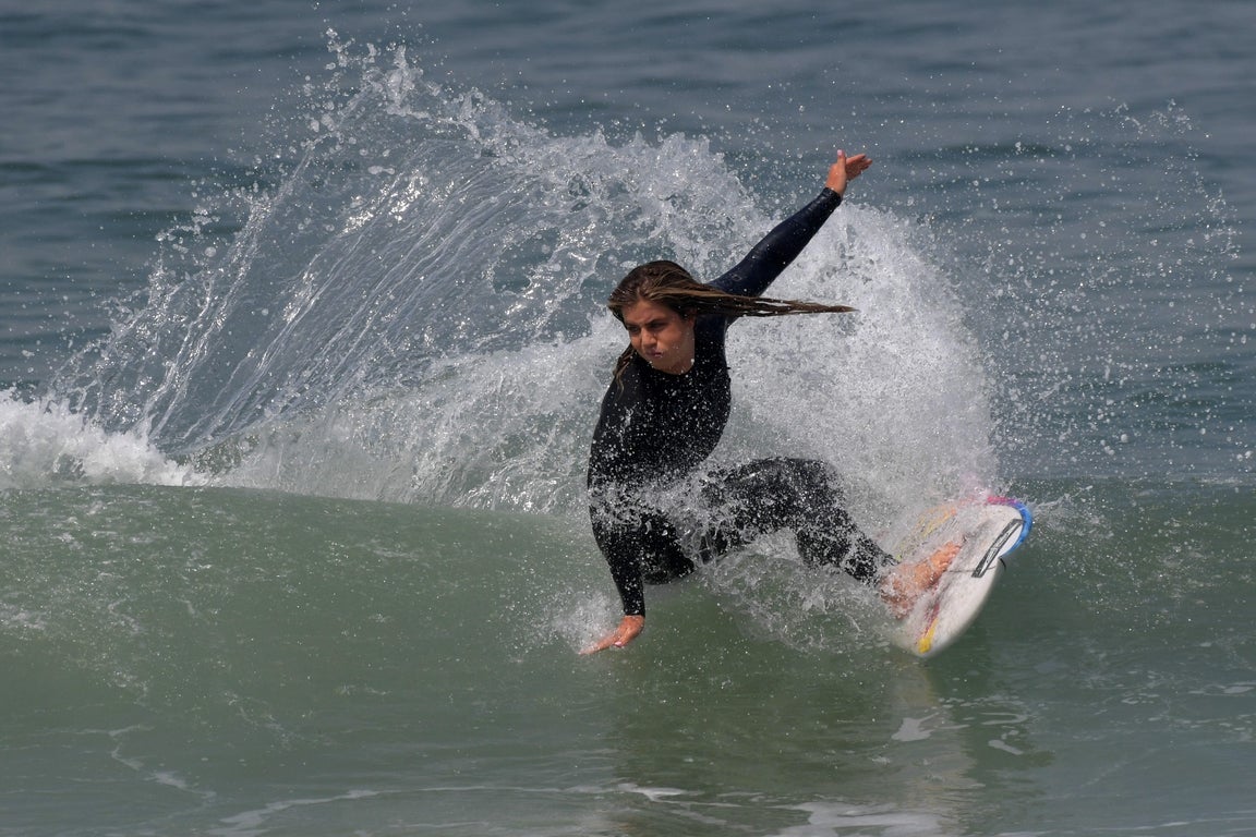 Elite female surfers who have posed for Sports Illustrated Swimsuit, in ...