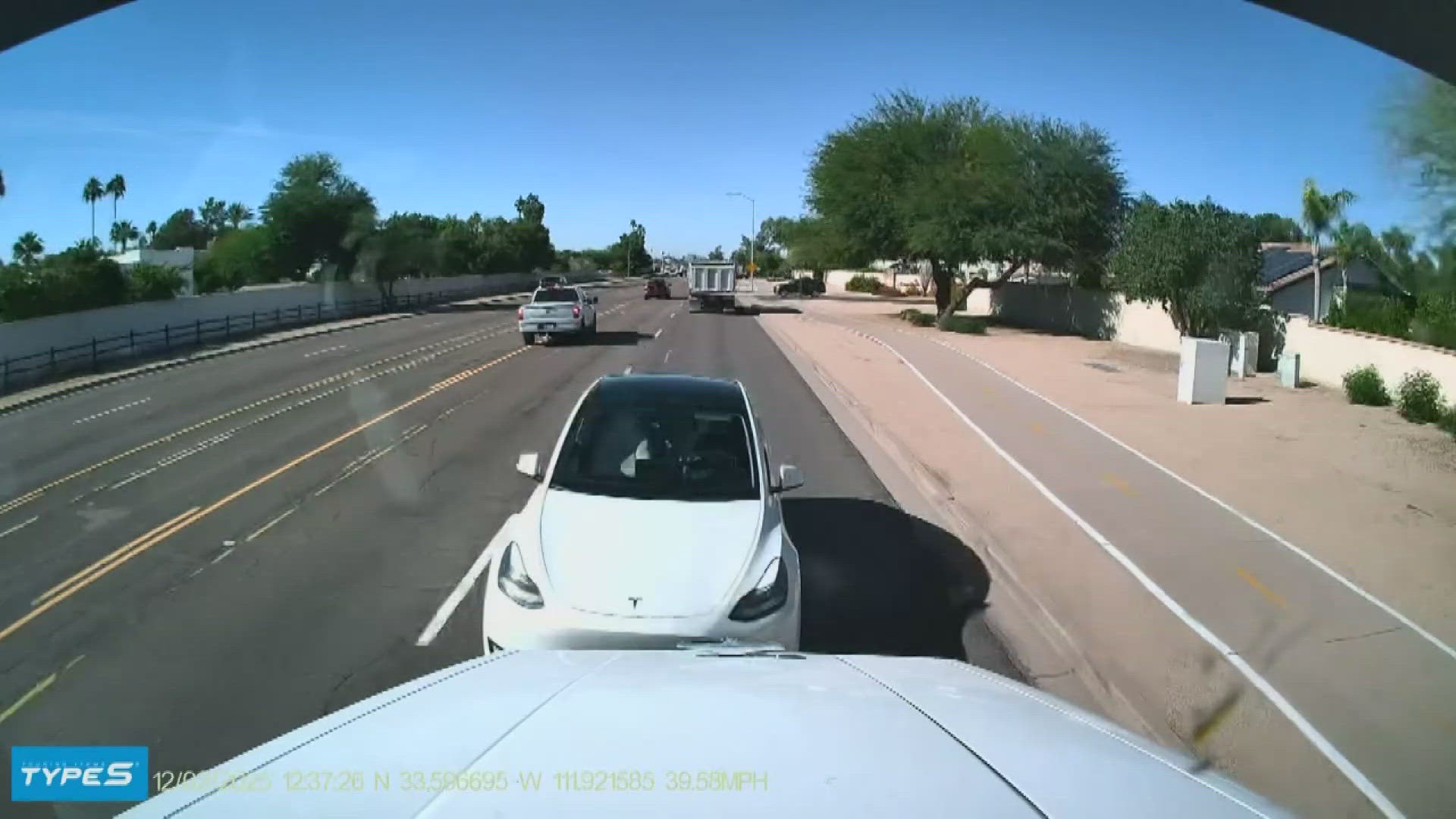 Video shows Tesla swerving head-on into dump truck before Scottsdale crash