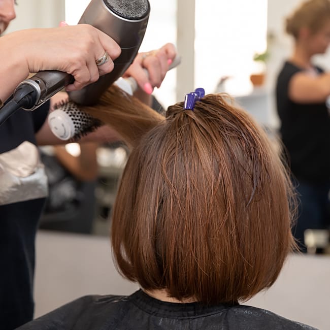 Article image featuring 2026 haircut trends as discussed by stylists.