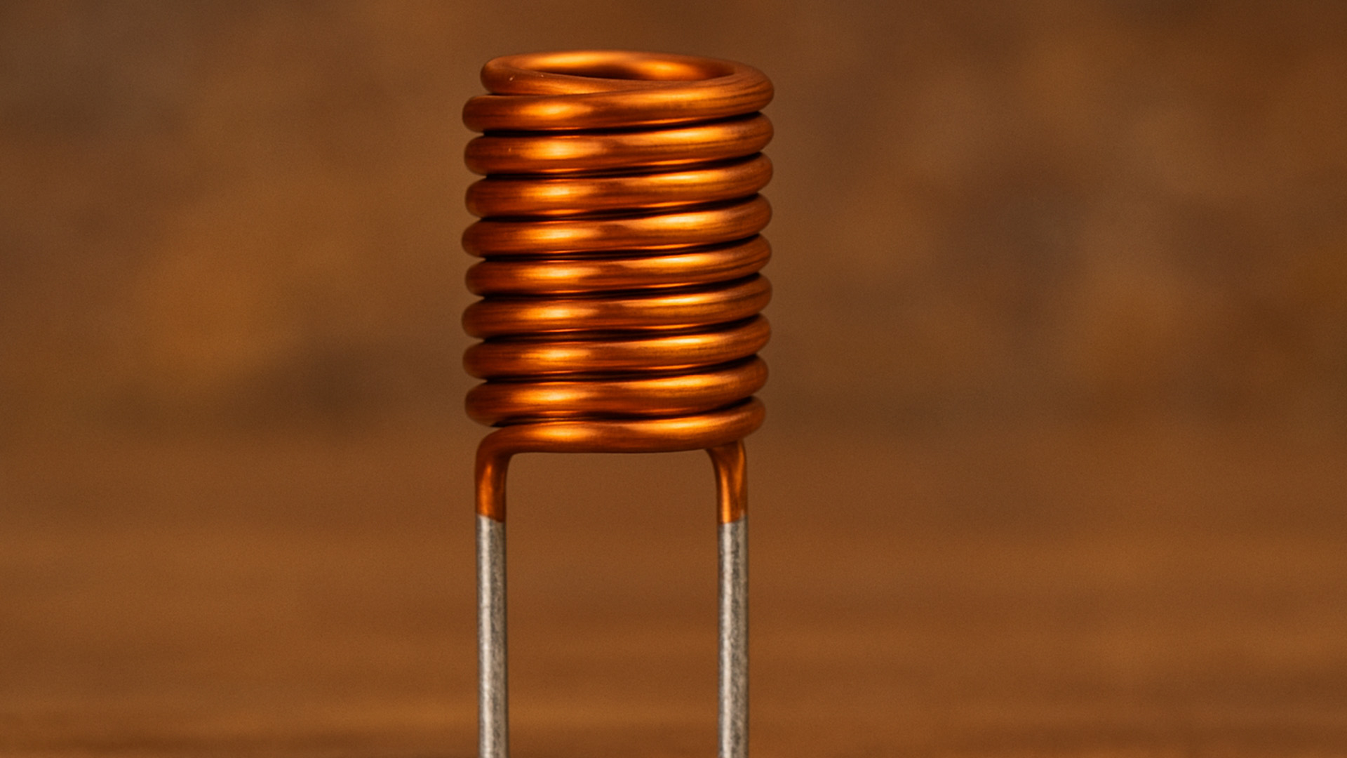 How does a coil control electric current?