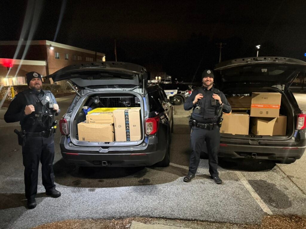 Mass. police force delivers Amazon packages found in the road