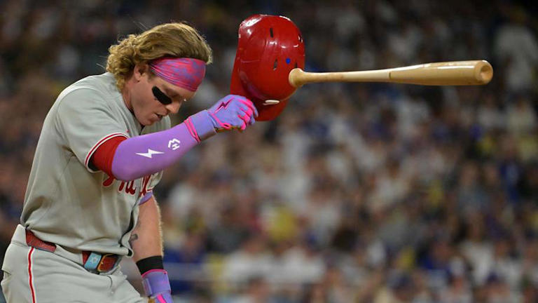 Sep 16, 2025; Los Angeles, California, USA; Philadelphia Phillies first baseman Bryce Harper (3) throws hit helmet and bat after striking out in the seventh inning against the Los Angeles Dodgers at Dodger Stadium. Mandatory Credit: Jayne Kamin-Oncea-Imagn Images | Jayne Kamin-Oncea-Imagn Images
