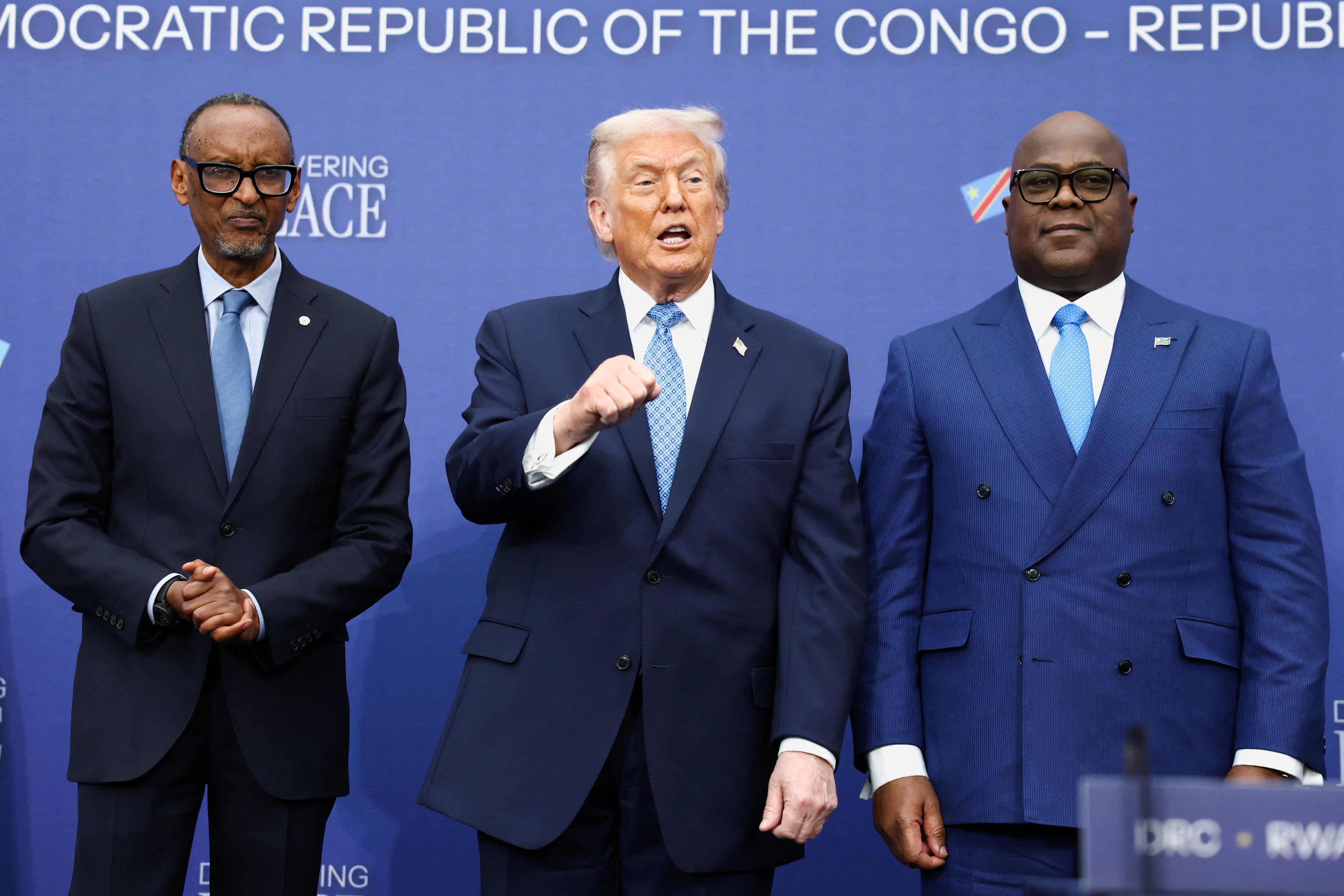 President Donald Trump, President of the Democratic Republic of the Congo Felix Tshisekedi and President of Rwanda Paul Kagame pose for a picture following a signing ceremony at the U.S. Institute of Peace in Washington, D.C., U.S., December 4, 2025.