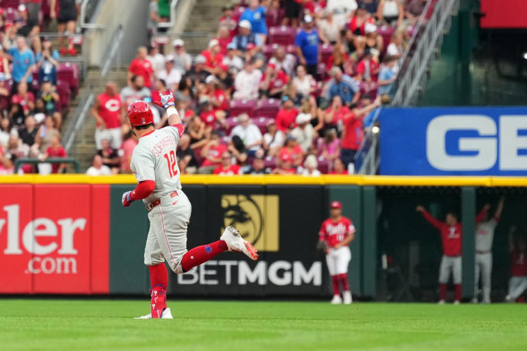 CINCINNATI, OHIO – AUGUST 11: Kyle Schwarber #12 of the Philadelphia Phillies celebrates a two run home run during the eighth inning against the Cincinnati Reds at Great American Ball Park on August 11, 2025 in Cincinnati, Ohio. Trea Turner #7 of the Philadelphia Phillies scored. (Photo by Jason Mowry/Getty Images)
