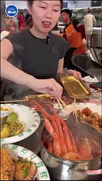 live-shrimp-jumps-onto-woman-as-she-prepares-to-cook-it