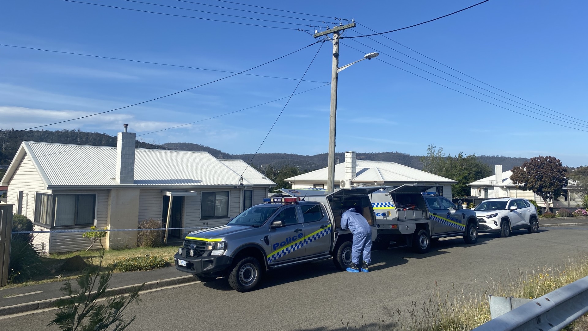 Man arrested after woman's body found at a Hobart home