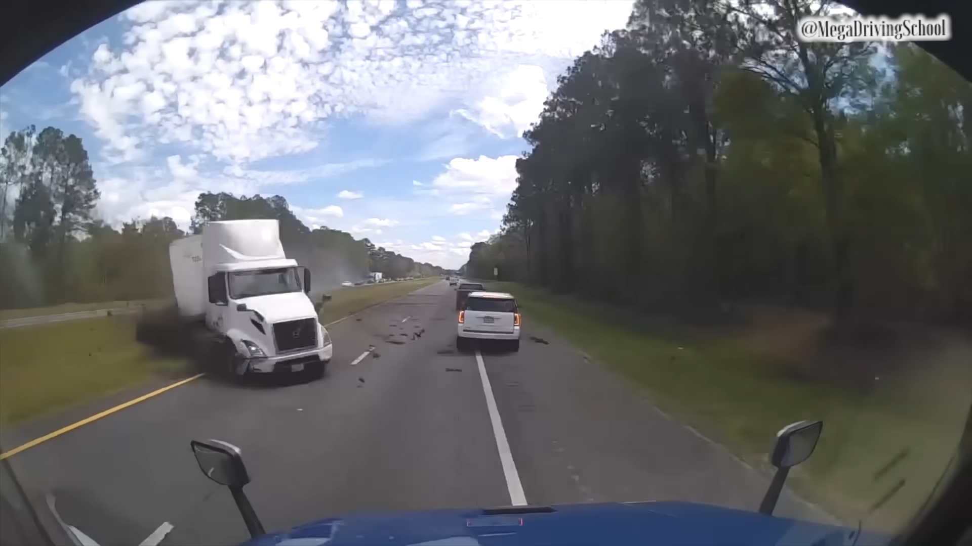 Out of control truck breaks through roadside barrier