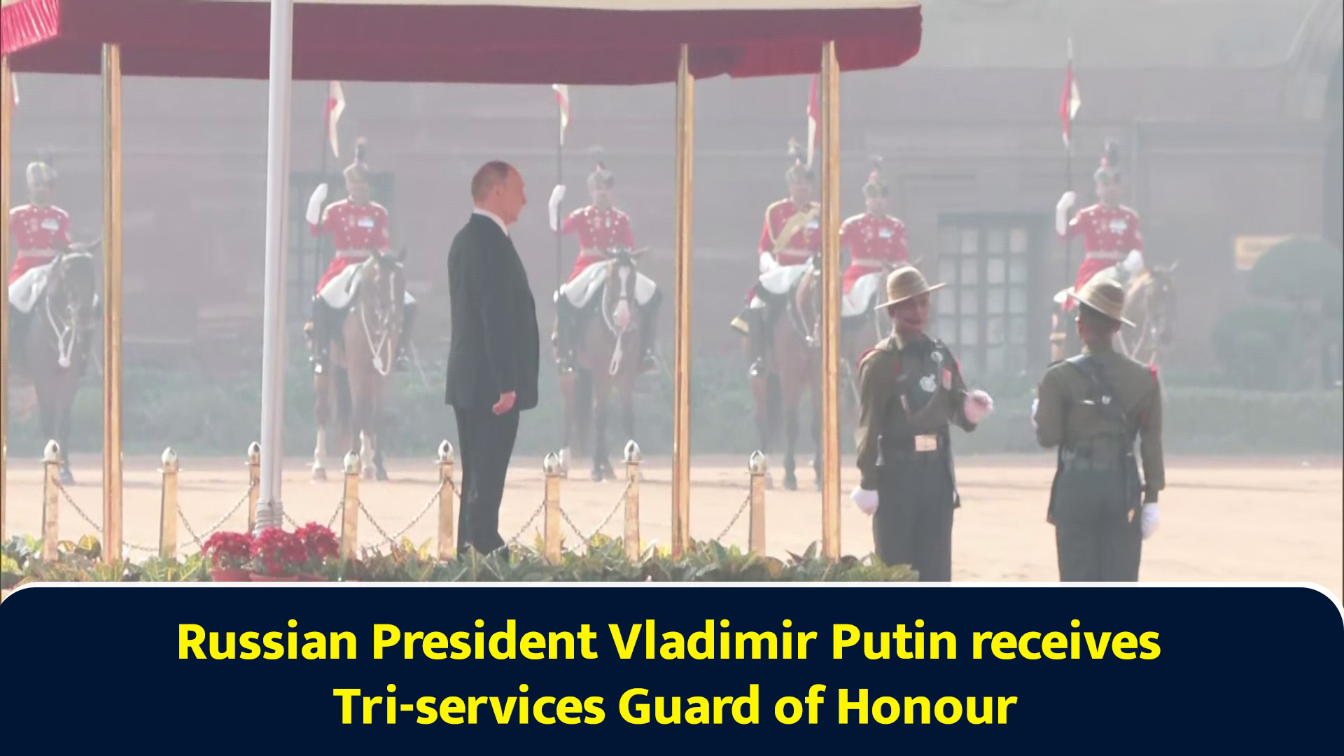 Russian President Vladimir Putin receives tri-services guard of honour