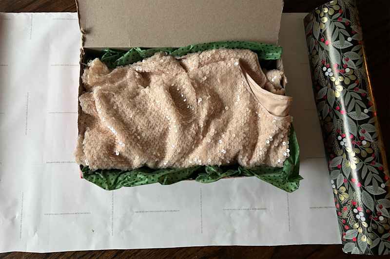Sequin shirt in box before gift wrapping.