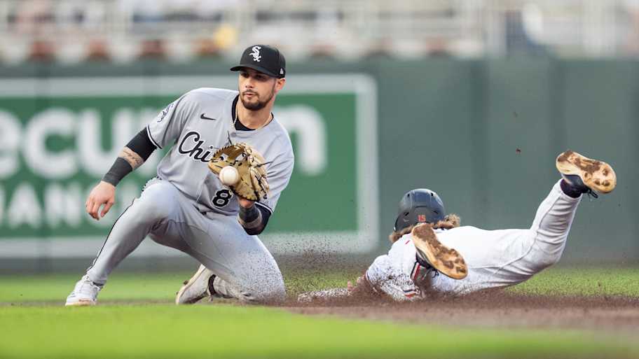 Apr 23, 2025; Minneapolis, Minnesota, USA; The throw to Chicago White Sox shortstop Jacob Amaya (8) is late as Minnesota Twins second base Luke Keaschall (15) slides safe into second base in the third inning at Target Field. Mandatory Credit: Matt Blewett-Imagn Images | Matt Blewett-Imagn Images