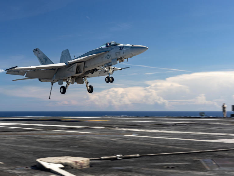 With a boom and sparks, this $60 million Navy jet's aircraft carrier ...
