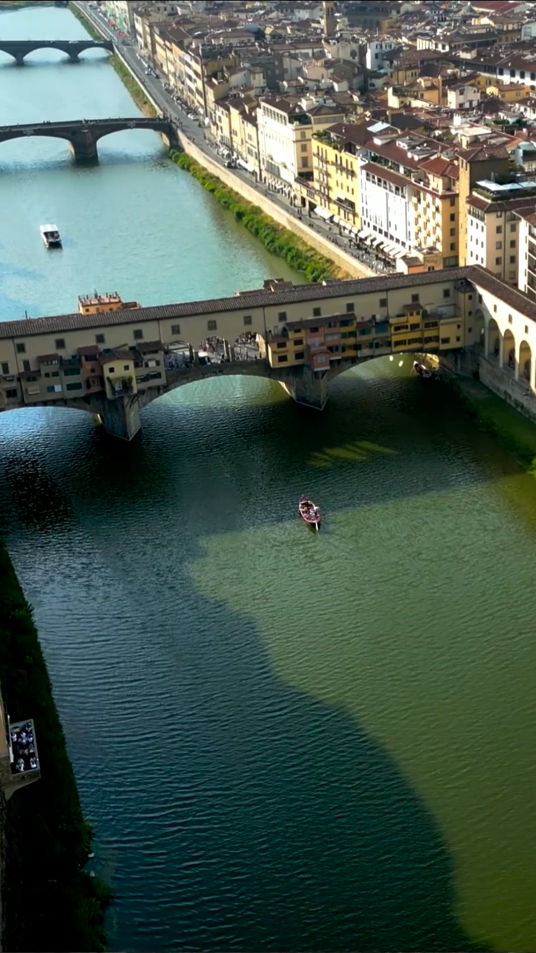 Soar above Florence's ancient Ponte Vecchio in stunning drone video
