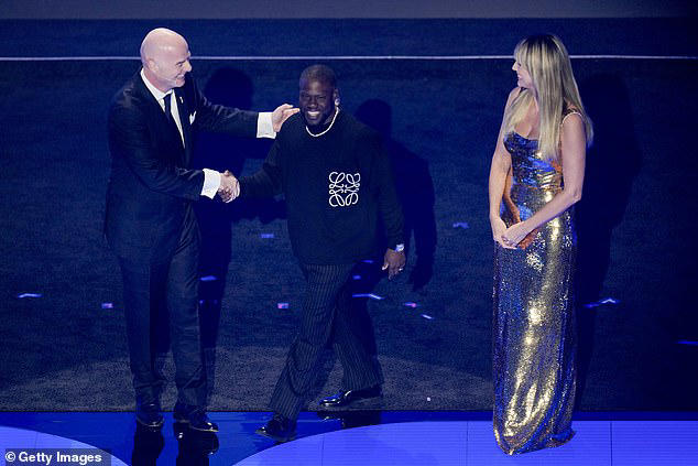 There were soon smiles afterwards when Hart and Infantino shook hands on stage