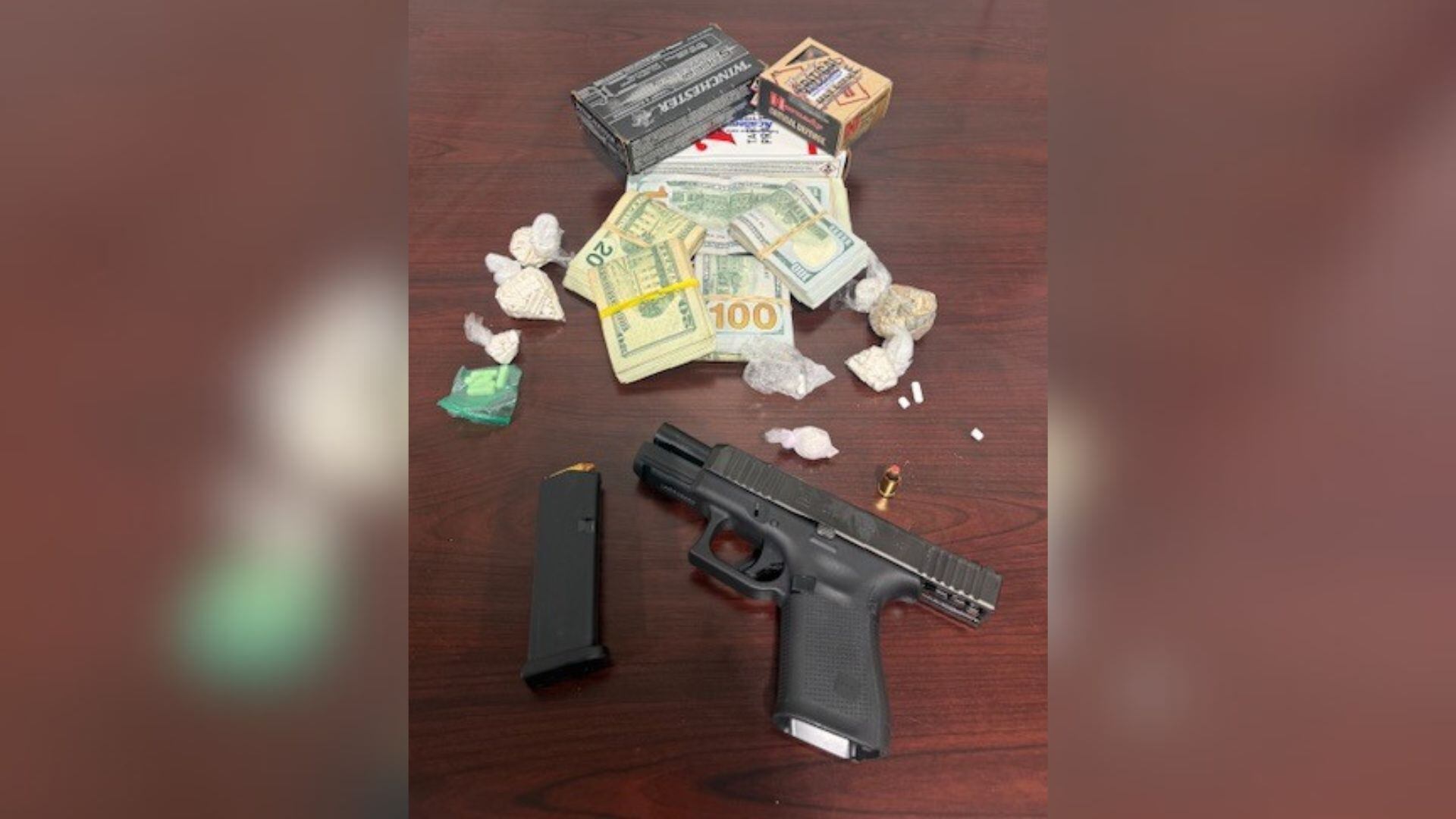 Felon reportedly found with gun, drugs, thousands in cash during ...