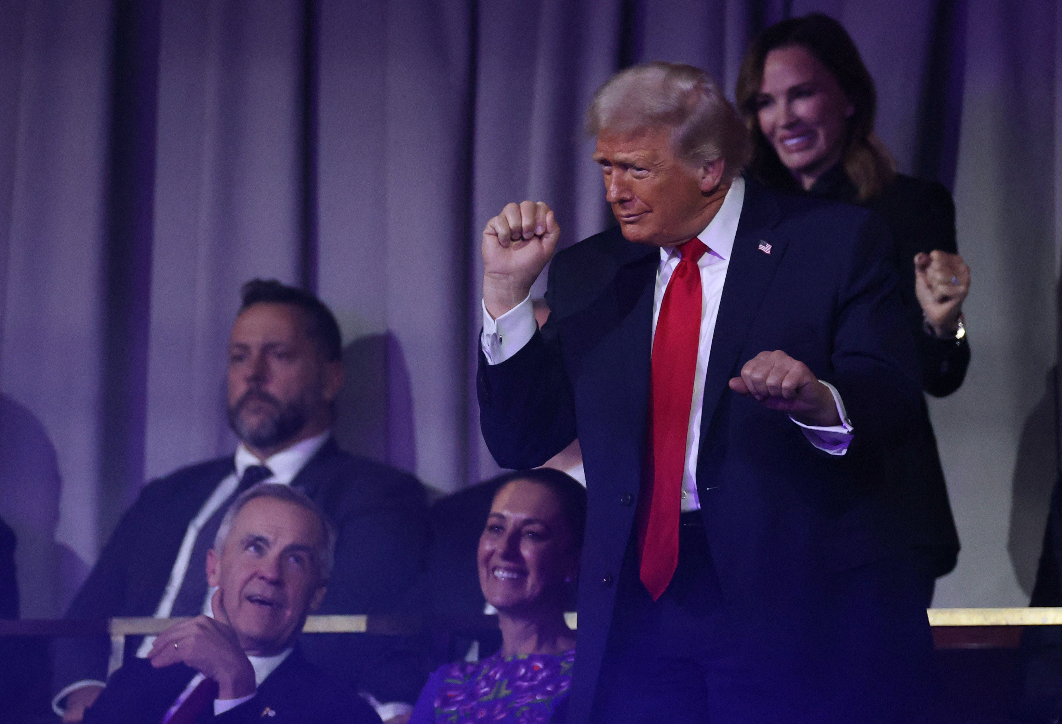 Donald Trump dances as Village People perform during the FIFA World Cup 2026 draw (Pool via REUTERS)