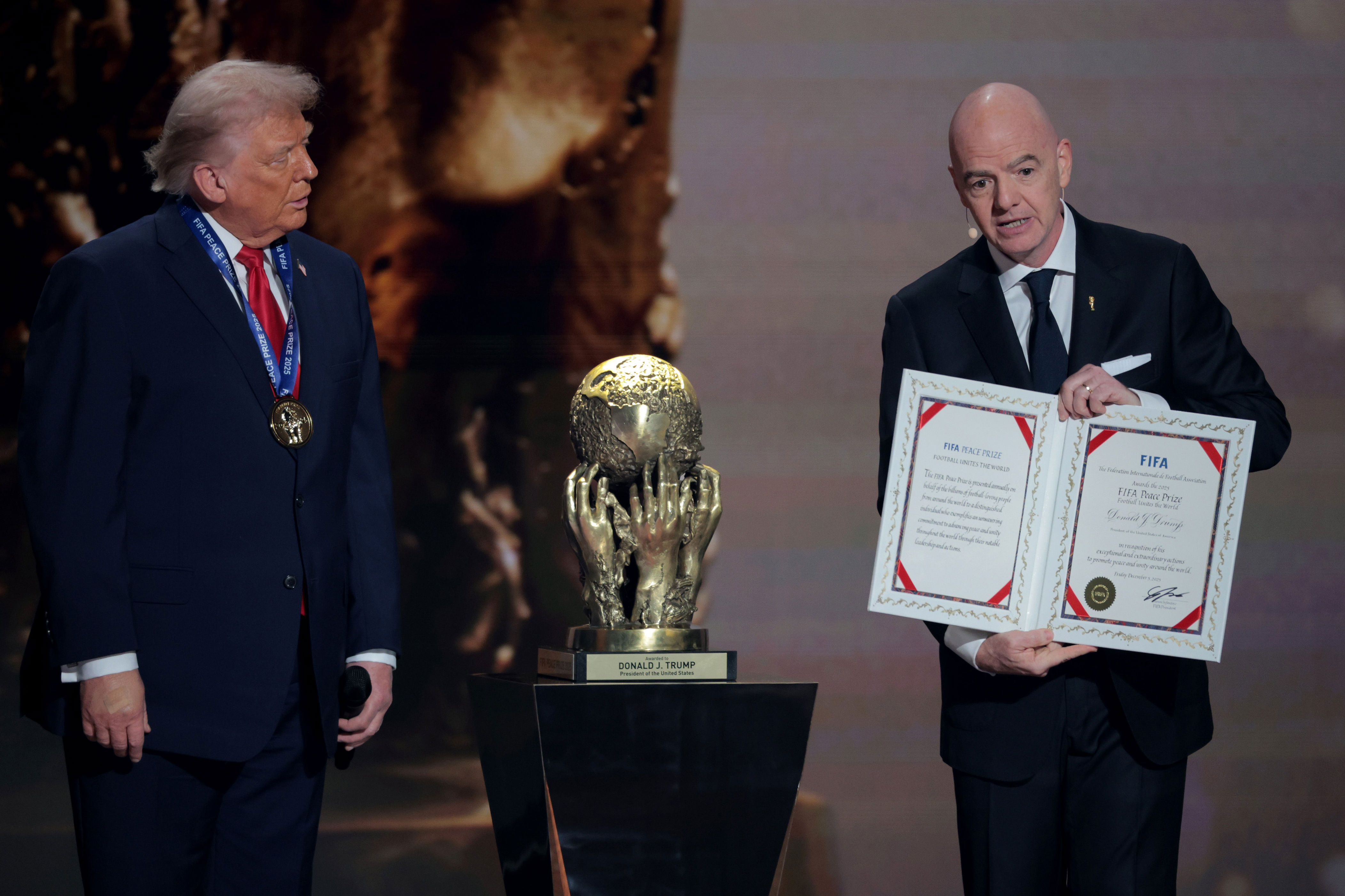 Gianni Infantino, President of FIFA, presents the FIFA Peace Prize for U.S. President Donald Trump (Getty Images)