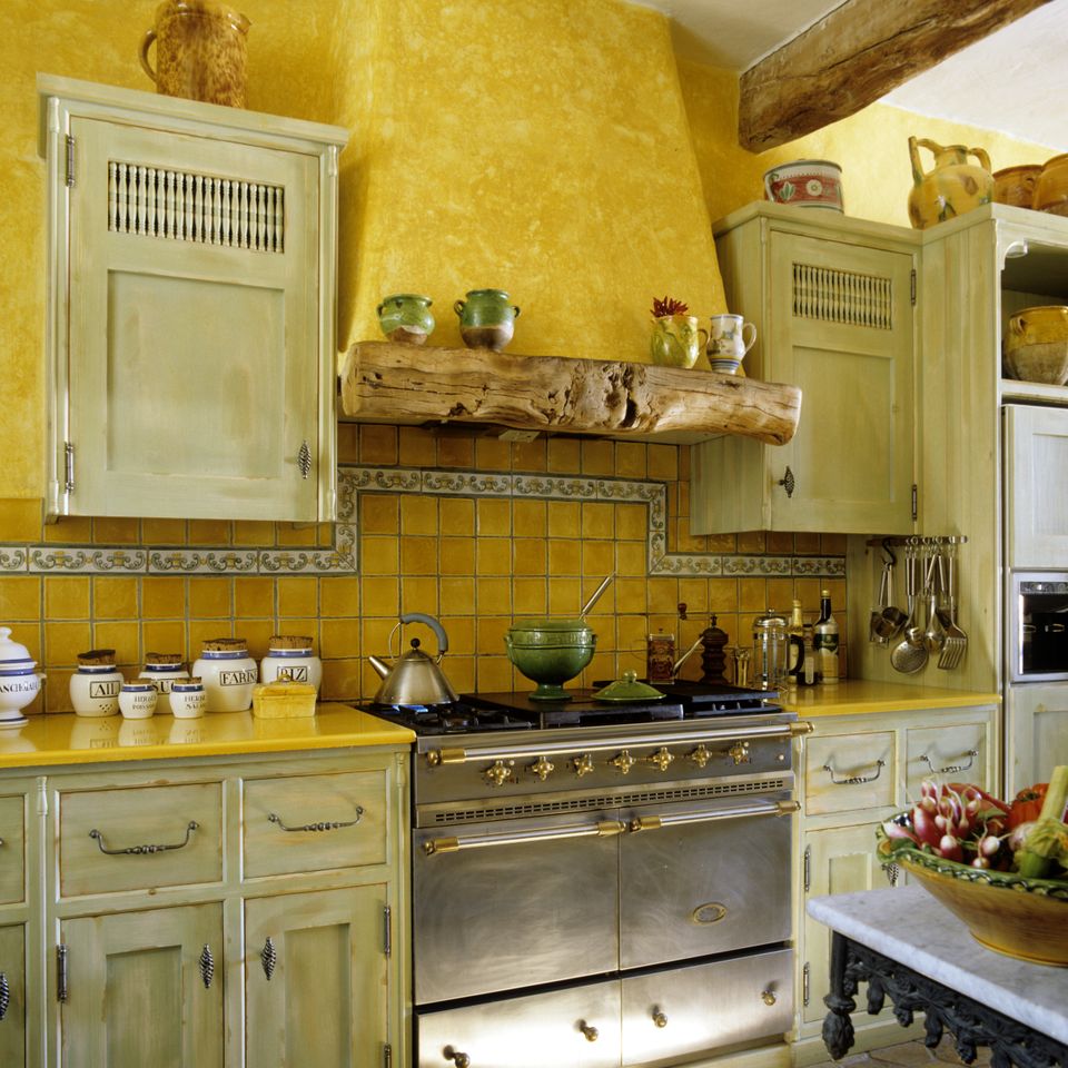 yellow kitchen with yellow countertops and tile