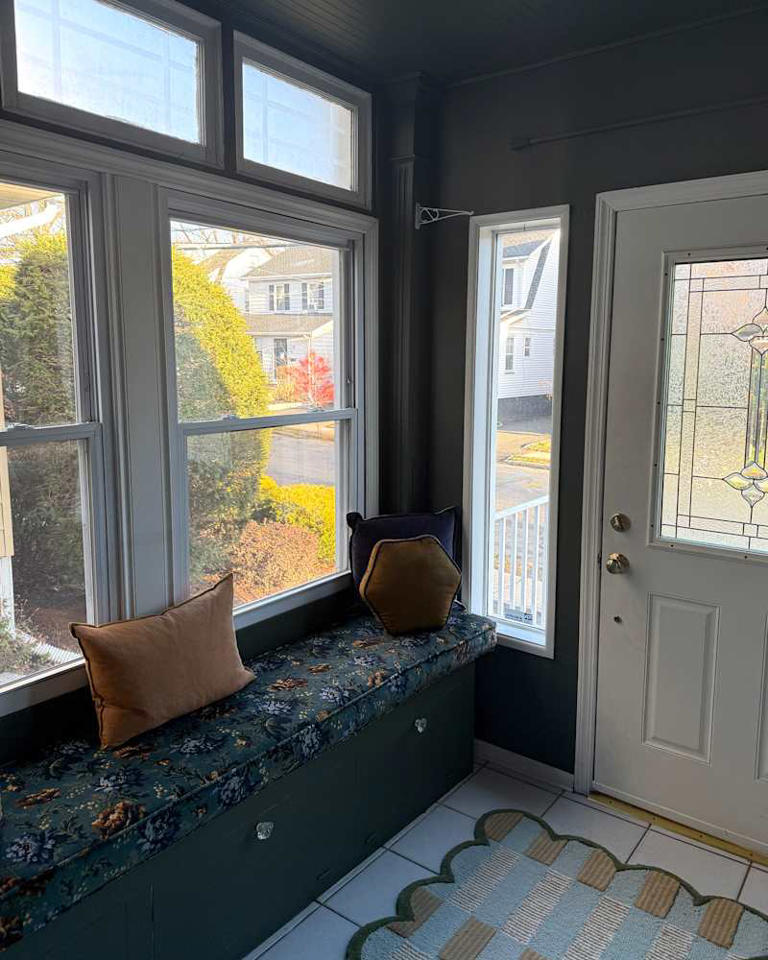 I painted my boring entryway moody green, and it's now cute as can be