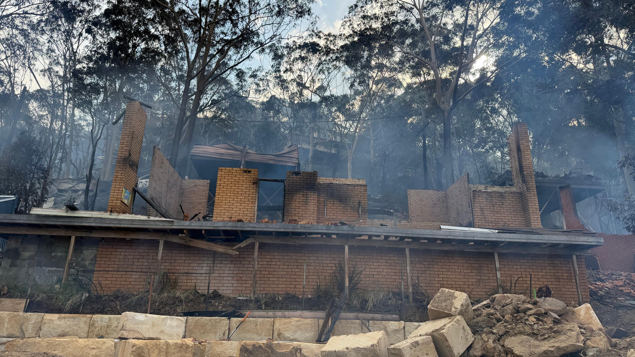 Fears number of homes lost in NSW fires could rise with gusty winds