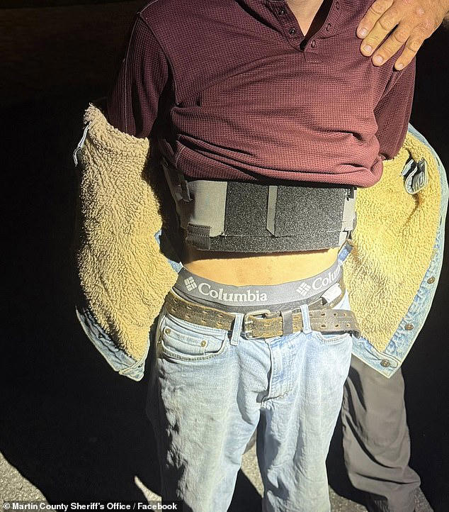 Cops swoop on armed man in a bulletproof vest behaving strangely during ...