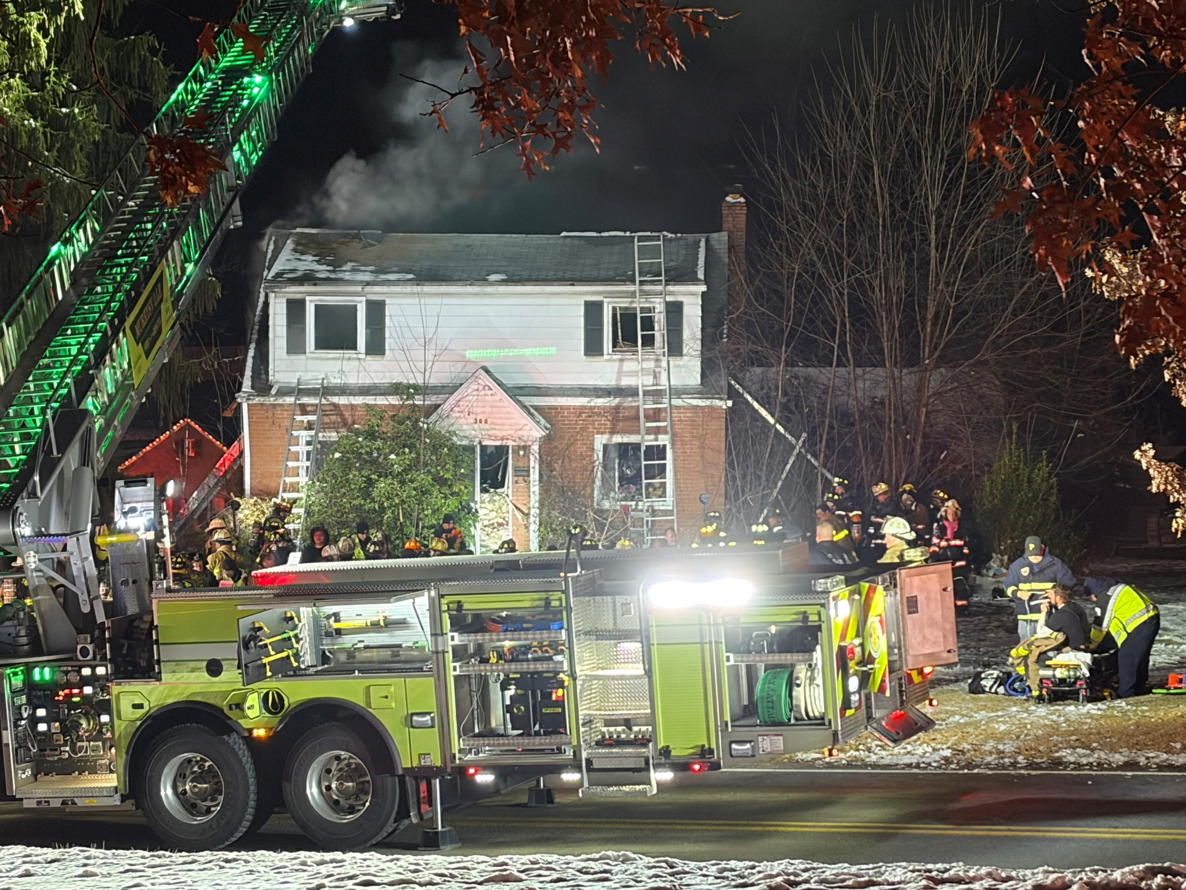 Person taken to hospital as crews battle house fire in Penn Township