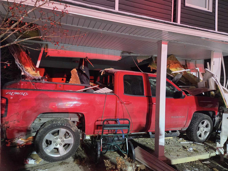 Pickup truck crashes into volunteer firefighter's home