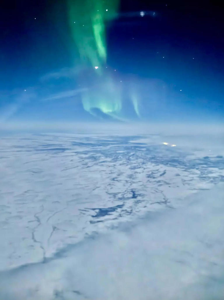Dancing skies over the North Pole: Northern lights captured from 35,000 ...