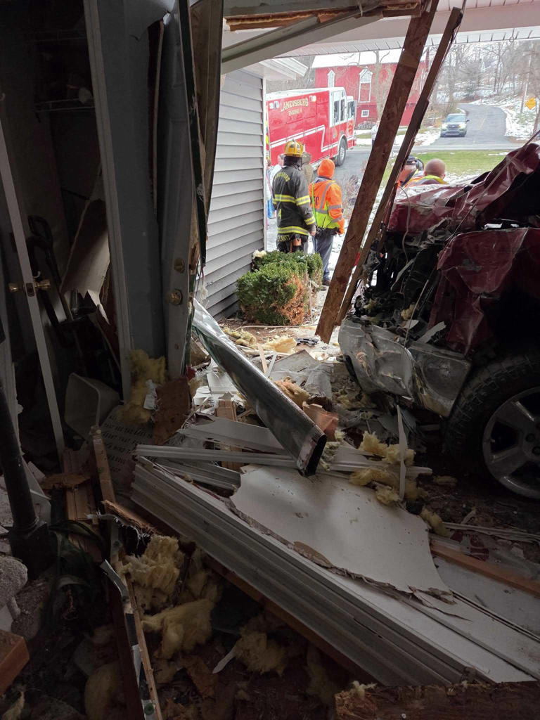 Pickup truck crashes into volunteer firefighter's home