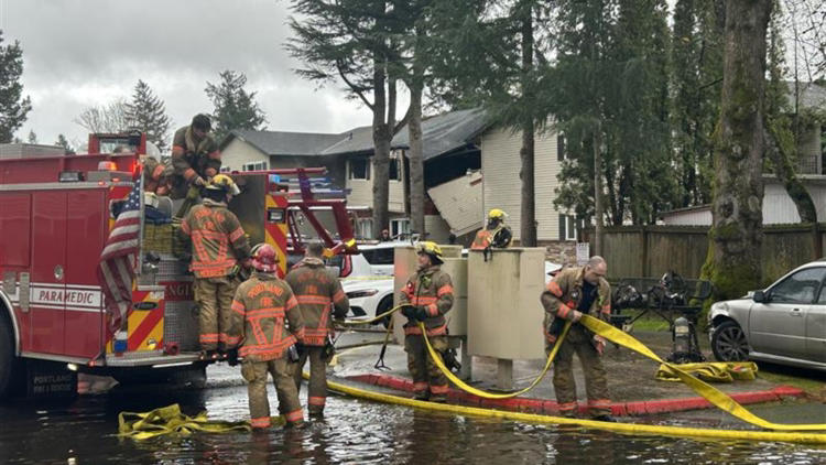 Residents jump to safety after fire and explosions at East Portland ...