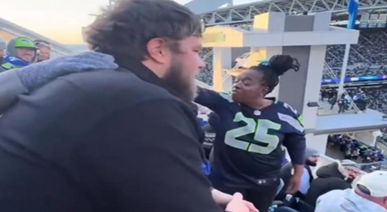 Black woman confronts drunk fan for spilling beer on her $150 coat at ...