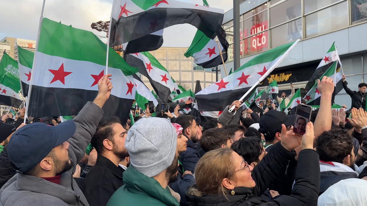Germany: Syrian crowds rally in Berlin on first anniversary of Assad's ...
