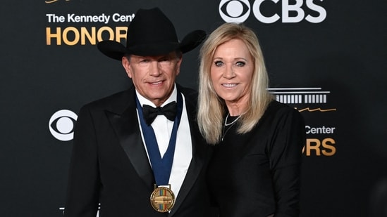 US country music singer and Kennedy Center Honoree George Strait and his wife Norma Strait