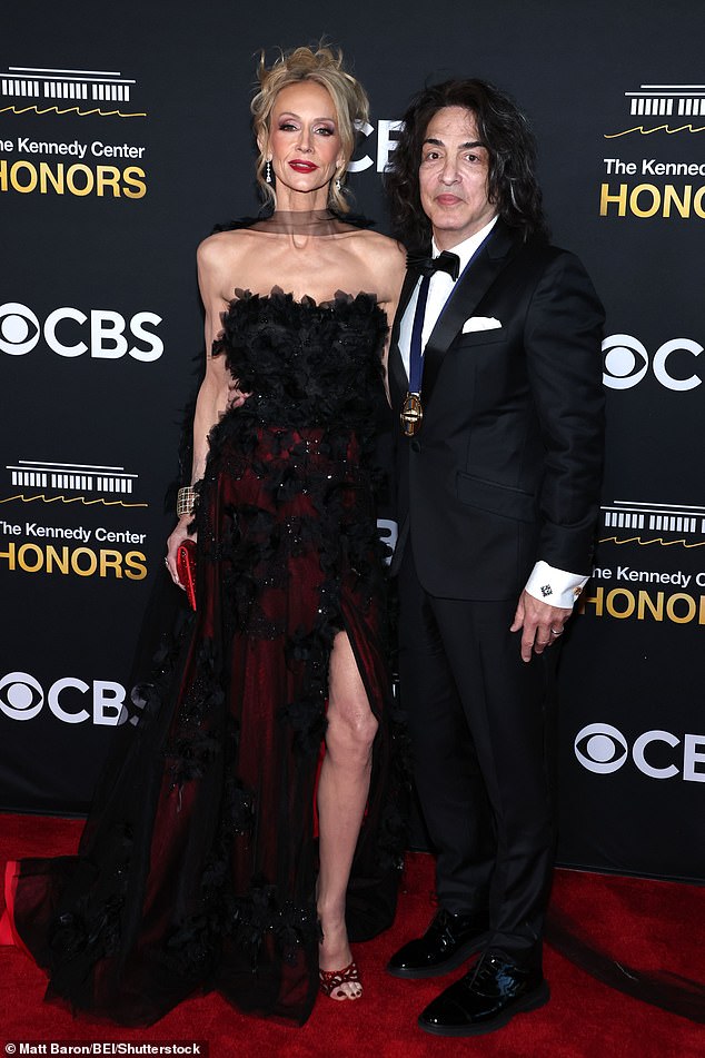 &nbsp;Paul Stanley and his wife&nbsp;Erin Sutton were pictured during entrances on Sunday&nbsp;