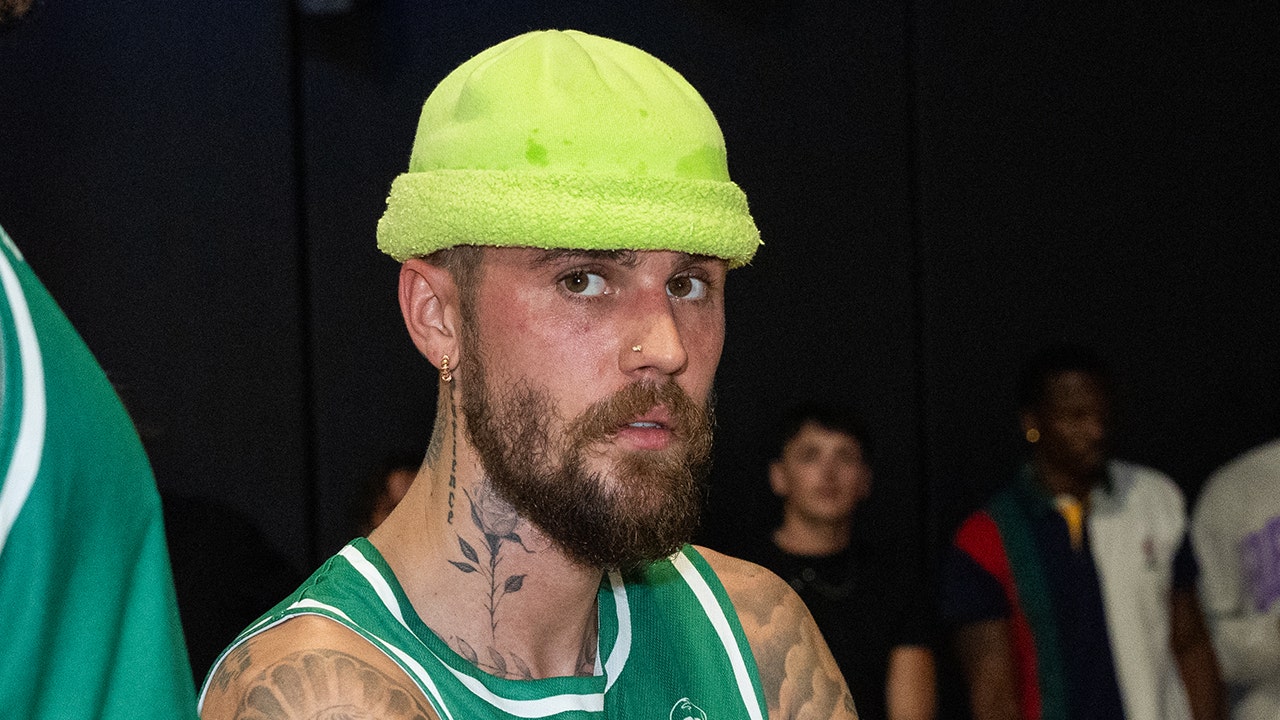 Justin Bieber threatened to put Apple employees in 'rear-naked choke hold' over popular iPhone function mishap. Getty Images