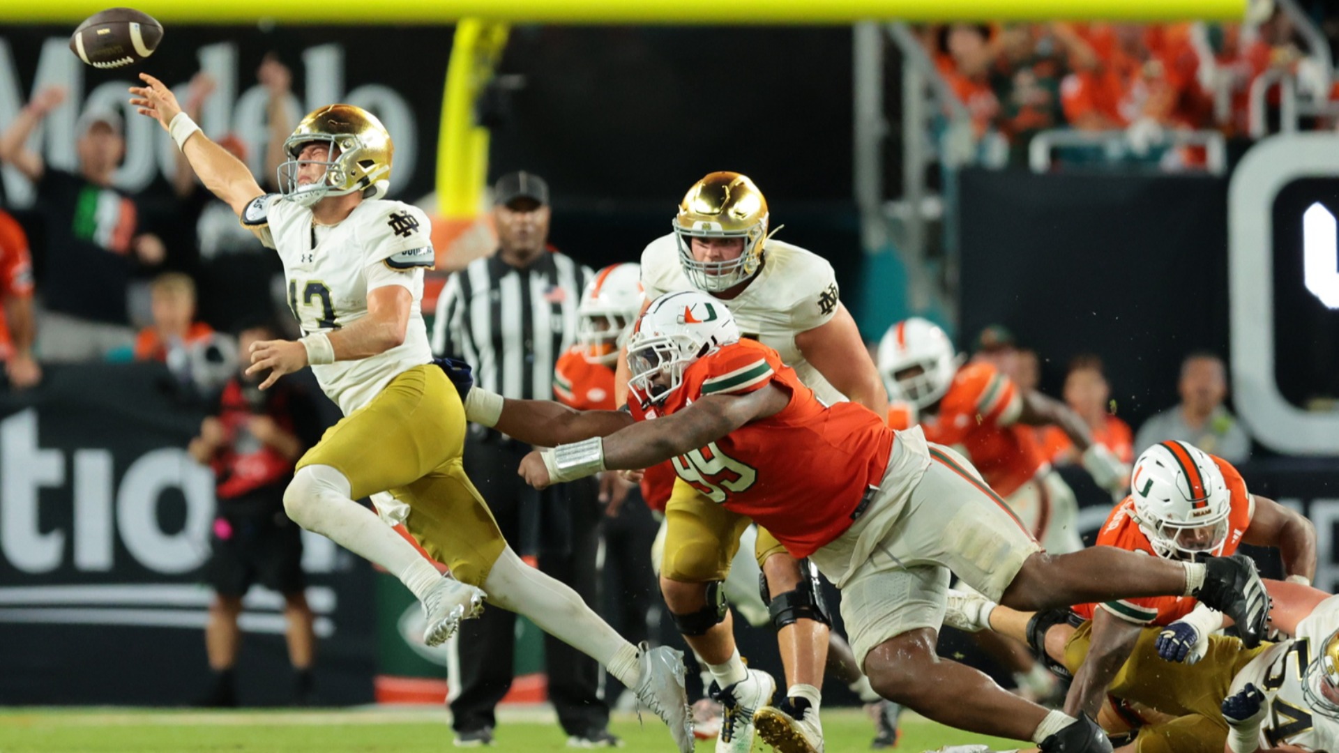 Debating college football losses - does who you lose to matter?
