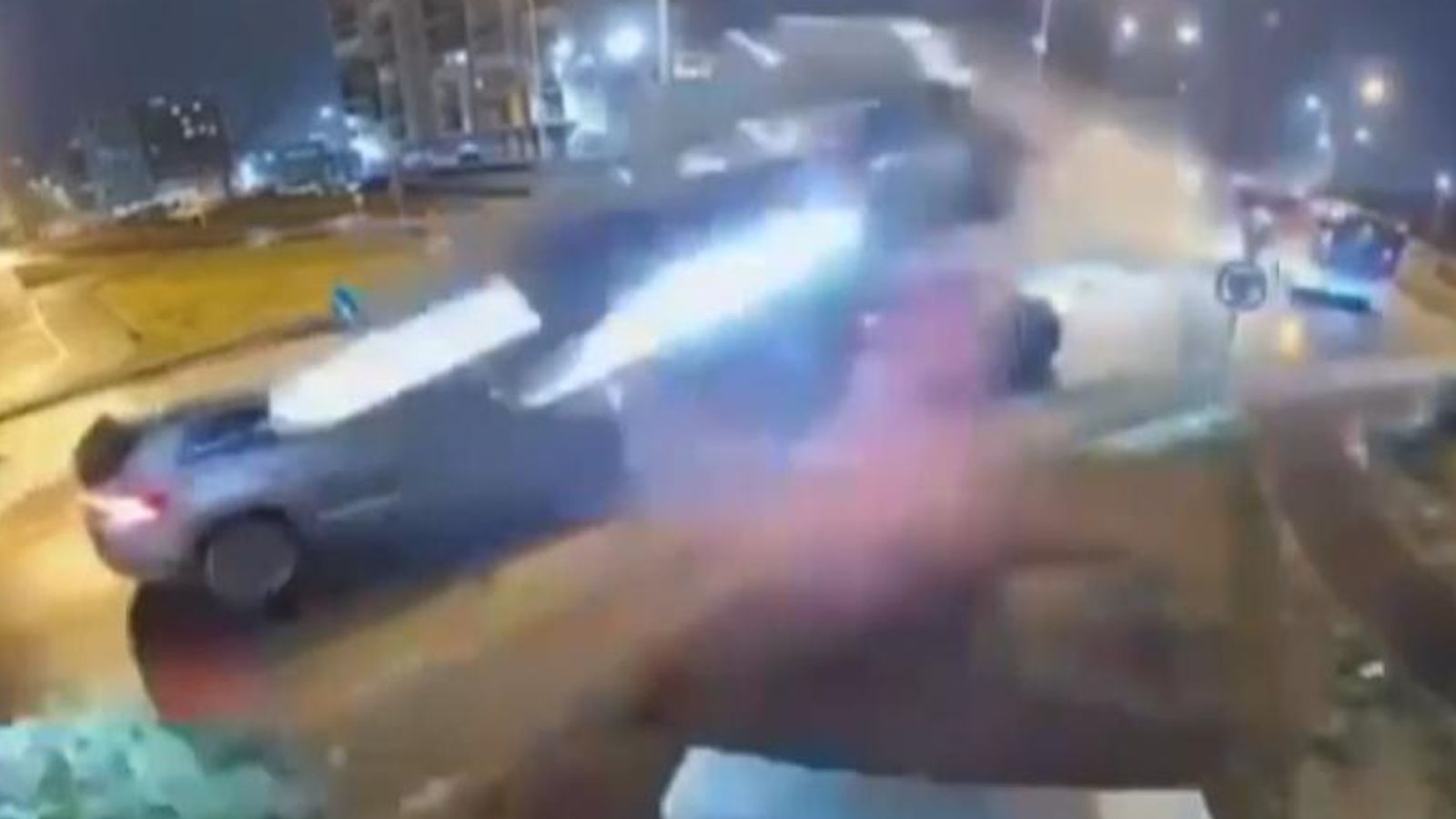 Out Of Control Car Flies Over Roundabout