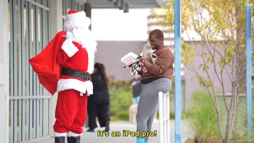 People react to Santa’s unexpected gifts