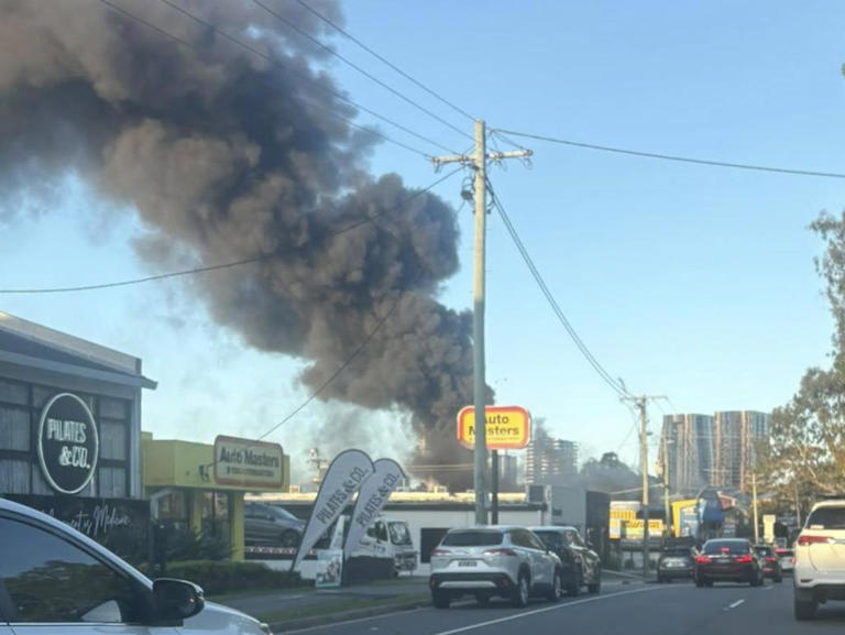 Fire rips through shop, sparks emergency