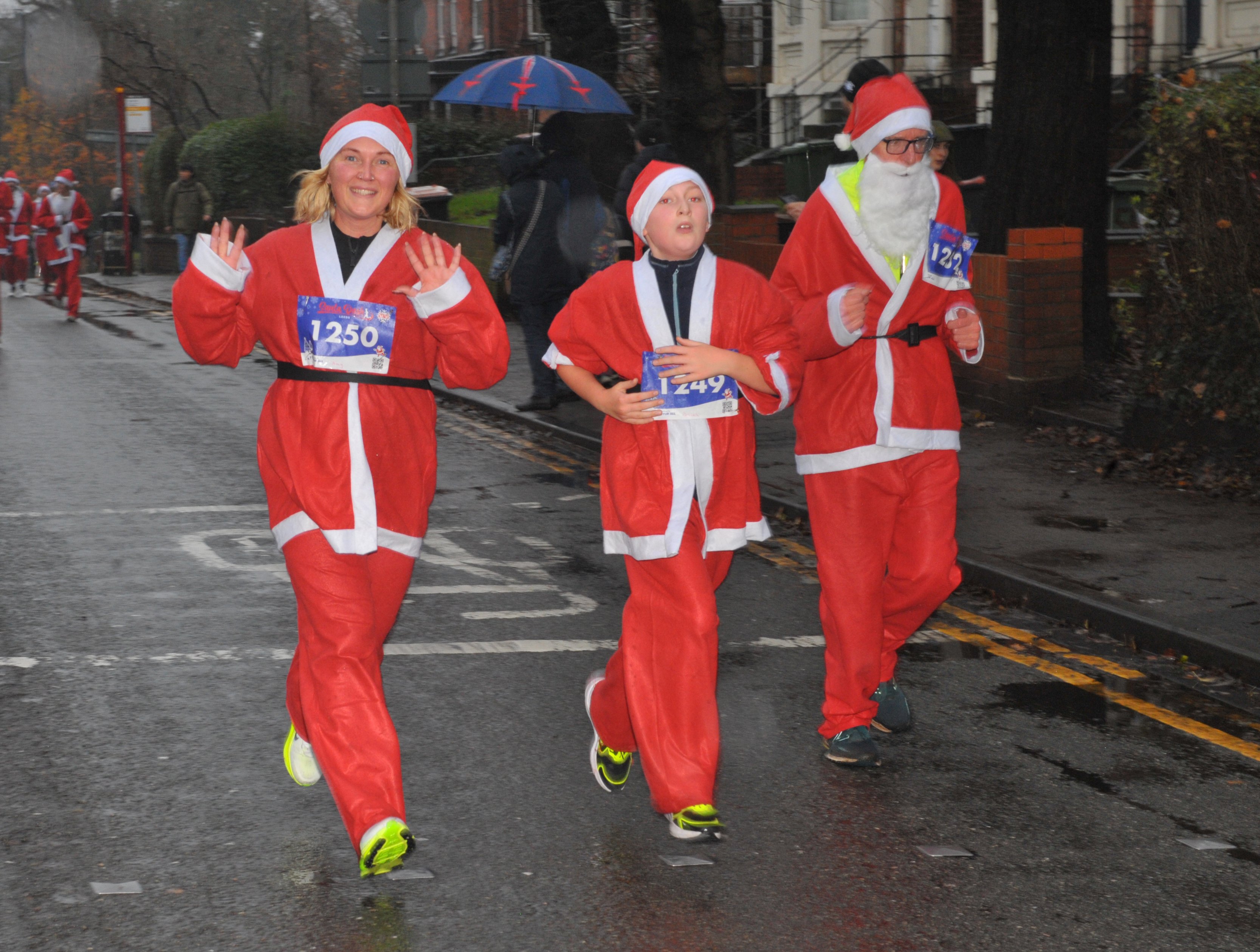 15 photos capture Leeds Santa Dash 2025 as hundreds of Santas fill the ...