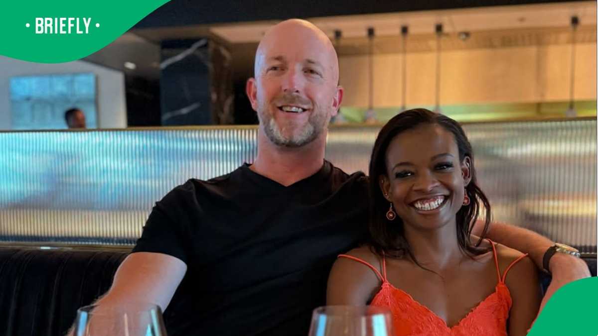 Look at the photo of Matthew Booth and girlfriend, Bongani Mthombeni ...