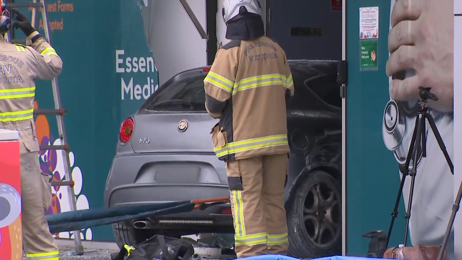 Man killed, woman injured after car veers over footpath and through ...