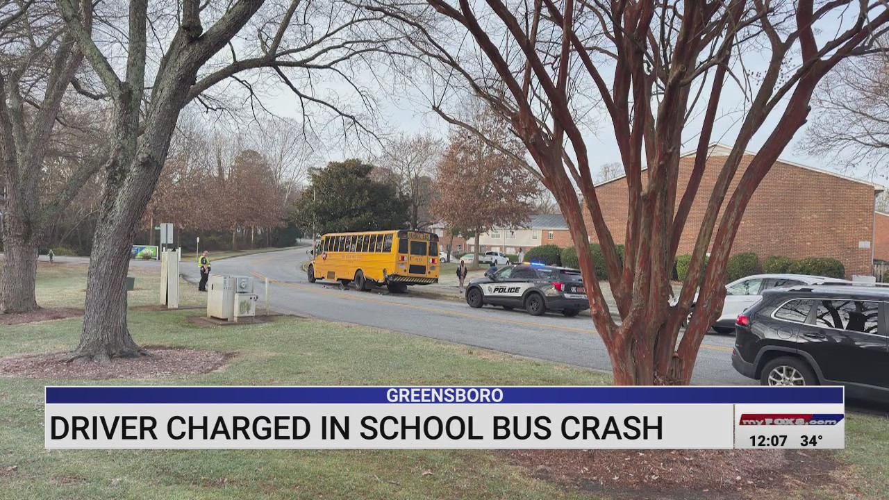 Man charged after crashing into Guilford County school bus