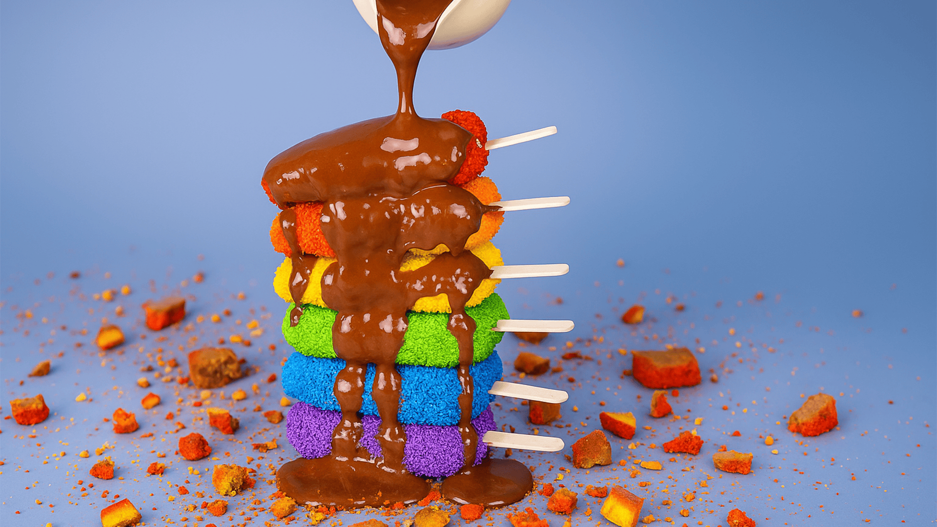 Rainbow crunch pops drizzled with chocolate delight