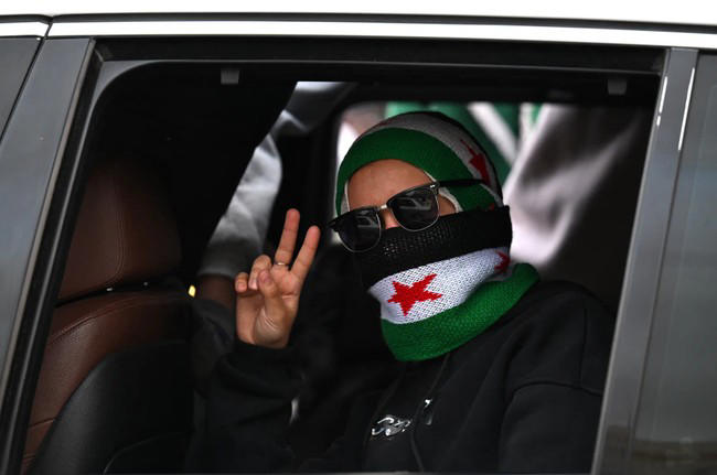In pictures: Tens of thousands celebrate as Syria marks one year since ...
