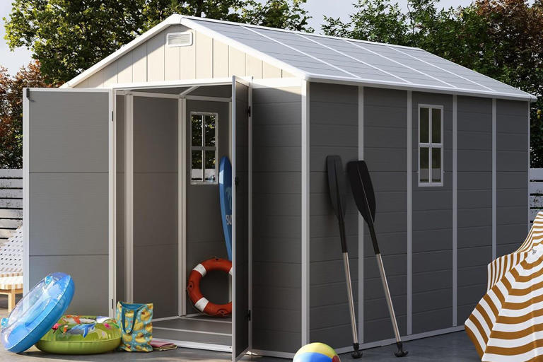 This pretty storage shed looks like a tiny house with its transom ...